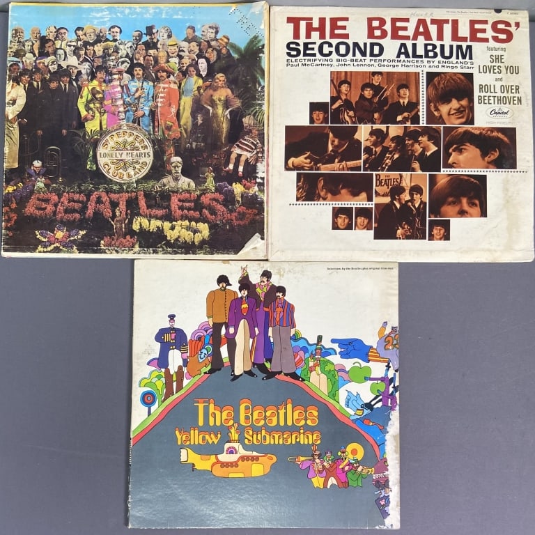 Vinyl Beatles Records Sgt Pepper Yellow Submarine Sgt. Pepper's Lonely Hearts Club Band, Capitol: Sgt. Pepper's Lonely Hearts Club Band, Capitol Records MAS-2653. Some water damage to cover, gatefold. Yellow Submarine, Apple Records SW-153. Some wear to cover. The Beatles' Second Album, Capitol Re