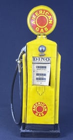 Vintage Tin Gas Pump Replica 17 inches tall by 5.25 by 3.5 inches.