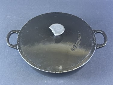 Vintage Le Creuset Dutch Oven #22 2 qt Scuffs and scratches overall and broken handle. Please refer