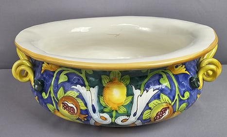 Vietri Italian Oval Ceramic Centerpiece Bowl Measures 15 x 7 inches tall. Crazing. Chip around rim.