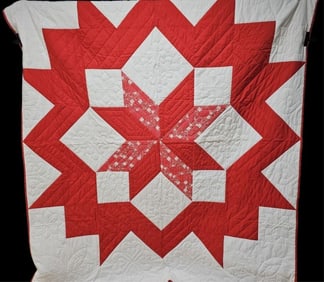 Red & White Carpenter’s Star Pattern Quilt Measures 88 x 71 inches. Few small stains. Please see