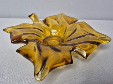 Vintage Amber Glass Ashtray Dish Measures 5 x 6 inches. Unmarked. Scratches around edges. Please see