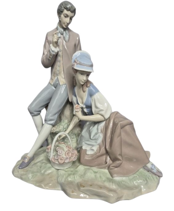 Lladro Porcelain Figurine Couple Pastoral 4669 Dimensions are approximately 7 inches in length 10.5: Dimensions are approximately 7 inches in length 10.5 inches in width 12 inches in height. One small crack near women's foot.