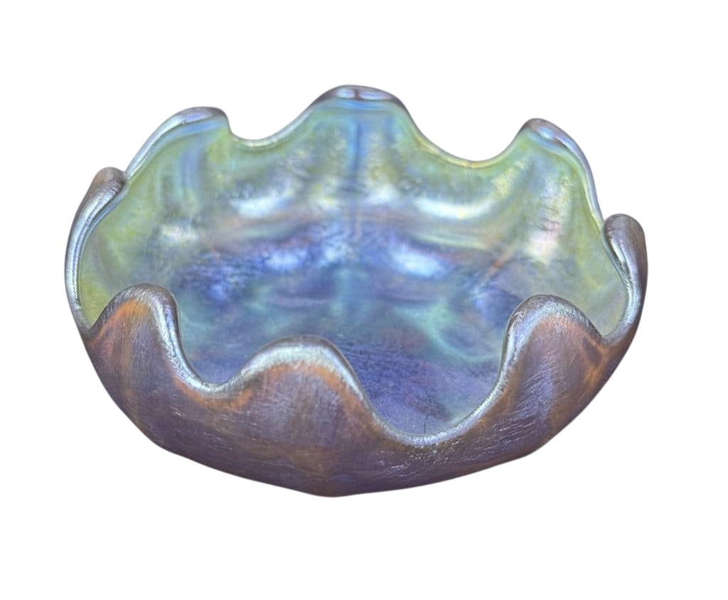 L.C. Tiffany Iridescent Glass Salt Cellar 3 x 1.25 inches. Free from damage. See photos for further: 3 x 1.25 inches. Free from damage. See photos for further item details and condition information.