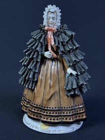 Sitzendorf Godey’s Fashions Figurine 1863 April 6.75 inches tall. 5 inches wide.   Good condition
