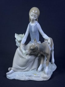 Lladro 4813 Girl With Calf Porcelain Figurine 8 x 7 x 5.5 inches. Free from chips or cracks. Please