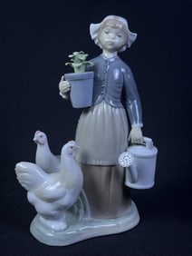 Lladro 1103 Girl With Hens Porcelain Figurine 9.25 inches tall by 5.5 inches wide by 4 inches deep.