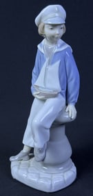 Lladro Porcelain Figurine 4810 Boy With Yacht Good condition free from damage.