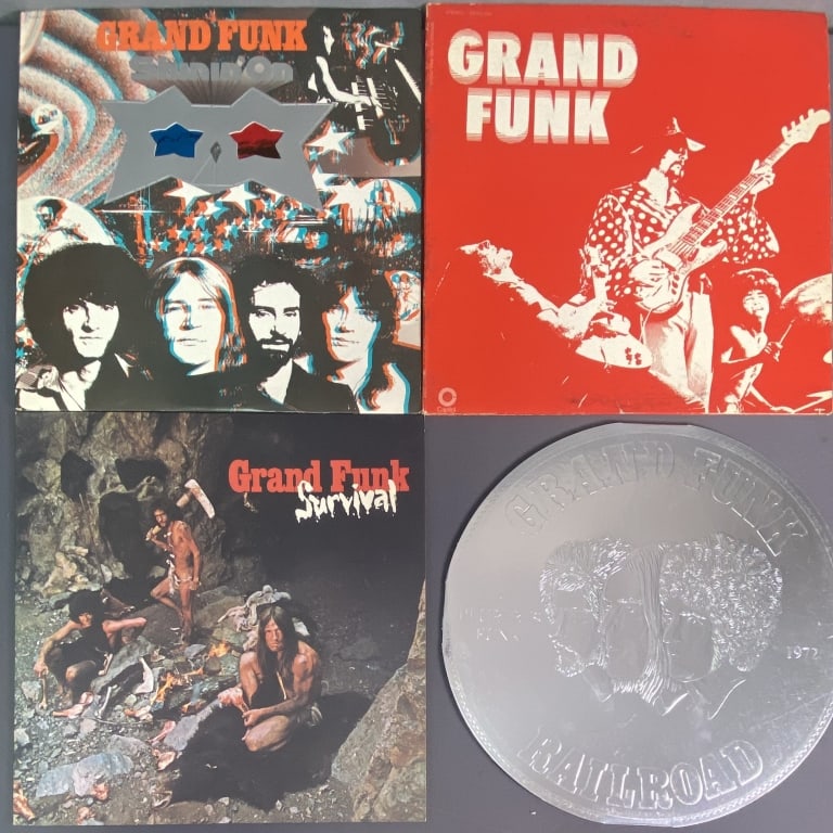Vinyl Records Grand Funk Railroad Set of Four Self titled album, Capitol Records SKAO-406,: Self titled album, Capitol Records SKAO-406, gatefold. E Pluribus Funk, Capitol Records SW 853. Circular cover, no sleeve. Survival, Capitol Records SW-764. Shinin On, Capitol Records SWAE-11278. Incl