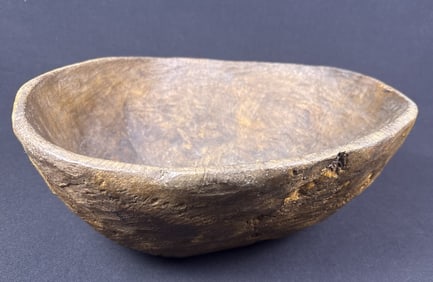 Vintage Primitive Carved Burl Wood Bowl Undated.   Measures approximately 15 x 12 x 6.5 inches.