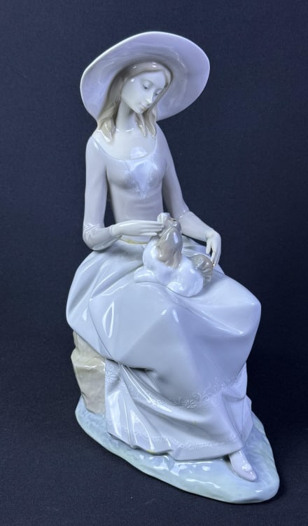 Lladro Porcelain Figurine 4806 Girl With Dog Has been damaged and repaired. Left finger and waist.: Has been damaged and repaired. Left finger and waist. Please refer to photos for further details. Measures approximately 13 x 9 x 6 inches