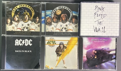CDs Led Zeppelin AC/DC Deep Purple Pink Floyd Six compact discs by famous classic rock bands. Titles