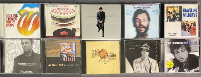 CDs Traveling Wilburys Rolling Stones Dylan Simon Set of ten compact discs.