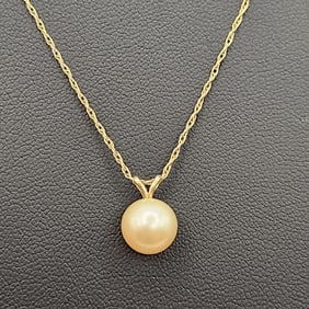 14K Yellow Gold 17" Pearl Necklace Weighs 2.0 grams.