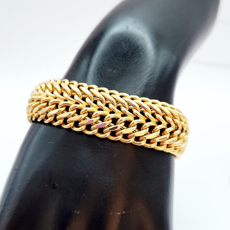 14K Yellow Gold Braided Link Bracelet Weighs 23.4 grams. Bracelet is 7".: Weighs 23.4 grams. Bracelet is 7".For the best shipping rates, please select "Self-Arranged." Once you've done this, you will automatically be added to Kellie's dedicated shipping department. No furth