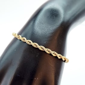 14K Yellow Gold Twist Bracelet Weighs 8.1 grams. Bracelet is 6.5".