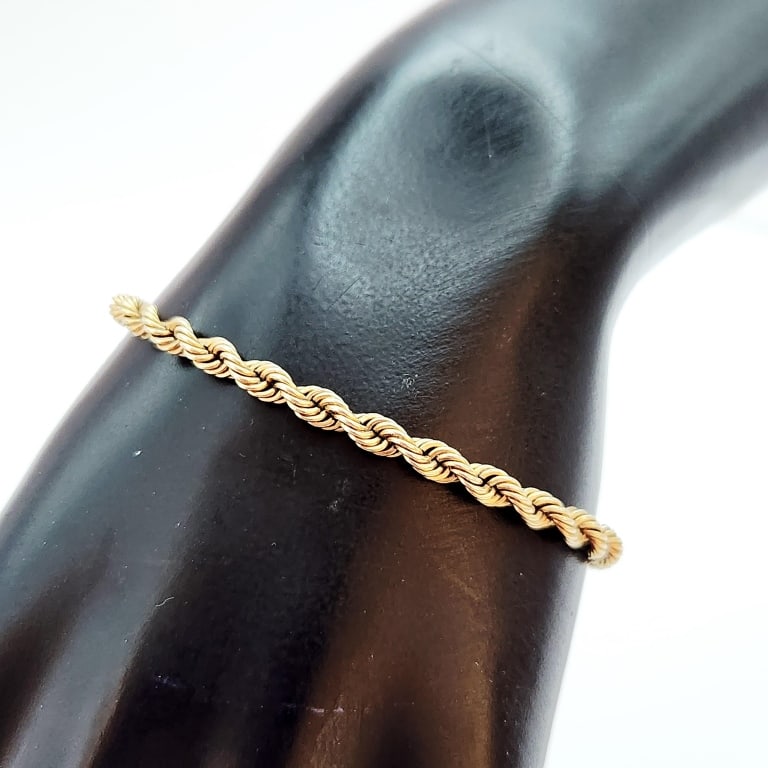 14K Yellow Gold Twist Bracelet Weighs 8.1 grams. Bracelet is 6.5".: Weighs 8.1 grams. Bracelet is 6.5".For the best shipping rates, please select "Self-Arranged." Once you've done this, you will automatically be added to Kellie's dedicated shipping department. No furt
