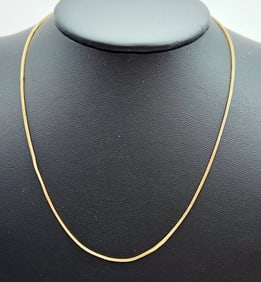 14K Yellow Gold Herringbone Chain Necklace Weighs 2.5 grams. Necklace is 16".