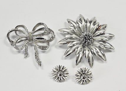 Vintage KJL Avon Bow Brooch & Floral Brooch No missing rhinestones in: No missing rhinestones in brooch. Silver flower brooch missing a bit of silver. See photo # 6 Both brooches silvertone metalFor the best shipping rates, please select "Self-Arranged." Once you've done