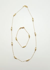 14K Yellow Gold Beaded Necklace & Bracelet Necklace is 18". Bracelet is 7". Lot weighs 7.8 grams.