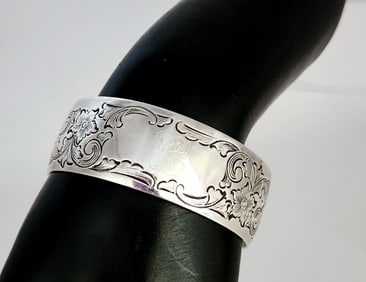 S Kirk & Son Sterling Floral Cuff Bracelet Monogrammed Weighs 37.6 grams.
