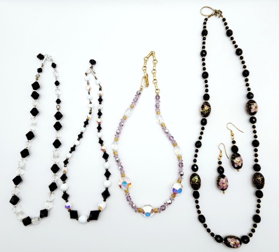 Faceted Black & Clear Glass Bead Choker Faceted Black & White Graduated Glass Bead AB One-Sided: Black & White Graduated Glass Bead AB One-Sided Finish Necklaces & Chinese Black & Pink Cloisonne Floral Bead Necklace & Dangle Drop Earrings Necklaces in order shown are 15", (2) 16" & 23". Please se