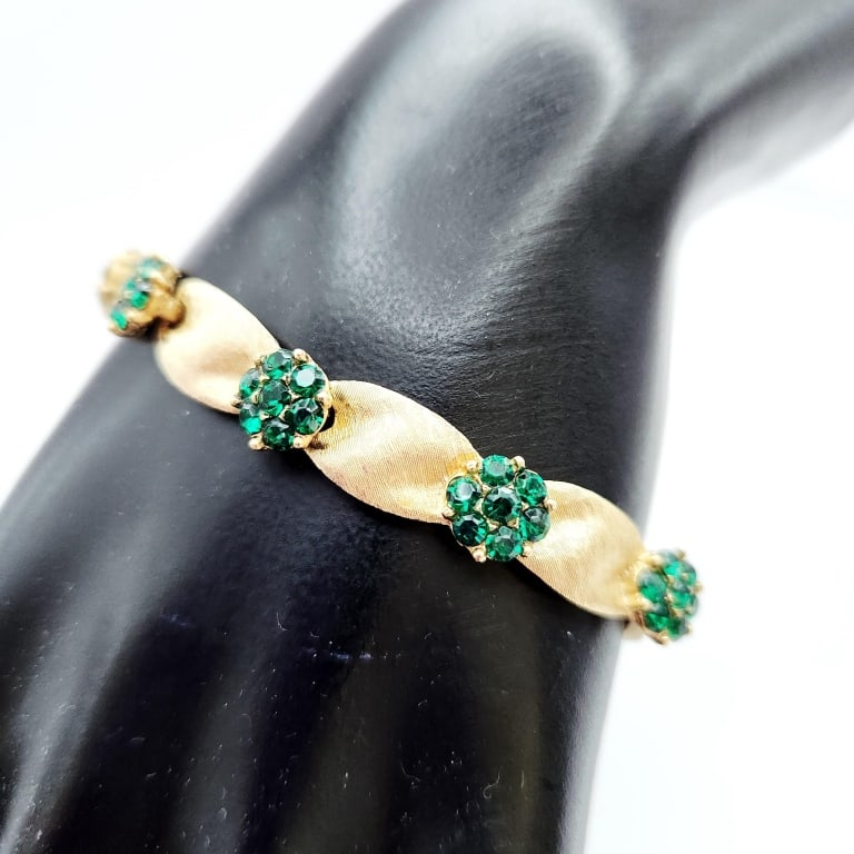 Crown Trifari Gold Tone Textured Ribbon Link & Green Rhinestone Flowers Birthday Bracelet: Green Rhinestone Flowers Birthday Bracelet Bracelet is 7". Please see images for details regarding condition.For the best shipping rates, please select "Self-Arranged." Once you've done this, you will