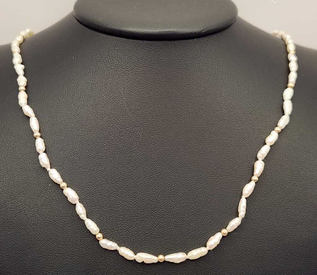 14K Yellow Gold & Freshwater Pearl 23" Necklace Weighs 9.1 grams.: Weighs 9.1 grams.For the best shipping rates, please select "Self-Arranged." Once you've done this, you will automatically be added to Kellie's dedicated shipping department. No further action is requ