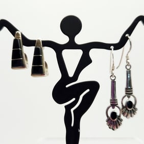 Lot Of 2 Pairs 925 Sterling & Onyx Earrings Lot weighs 10.8 grams.