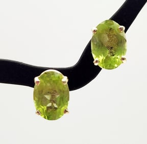 14K Yellow Gold Peridot Stud Earrings Backs are not 14K. Weighs 1 gram.