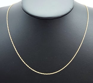 14K Yellow Gold Fine Chain Necklace is 24" Weighs 1.0 gram. Marked 585.