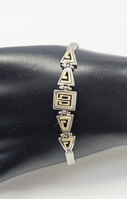 14K Yellow & White Gold Bracelet Bracelet weighs 8.4 Grams Bracelet measures 7 inches Safety Clasp