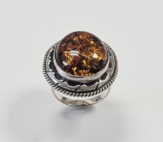 Sterling Silver Domed Amber Ring Ring is a size 7 Ring weighs 11.3 Grams