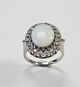 14K White Gold Oval Opal & CZ Ring Ring is a size 6.5 Ring weighs 6.0 grams