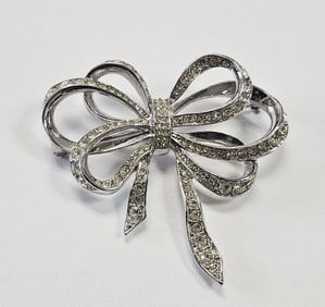 Vintage KJL For Avon Rhinestone Bow Brooch This is a vintage Kenneth Jay Lane for Avon silver-tone