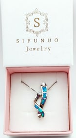 925 Sterling Sifunuo Blue Fire Opal Pendant Necklace Necklace is 16". Weighs 4.4 grams.