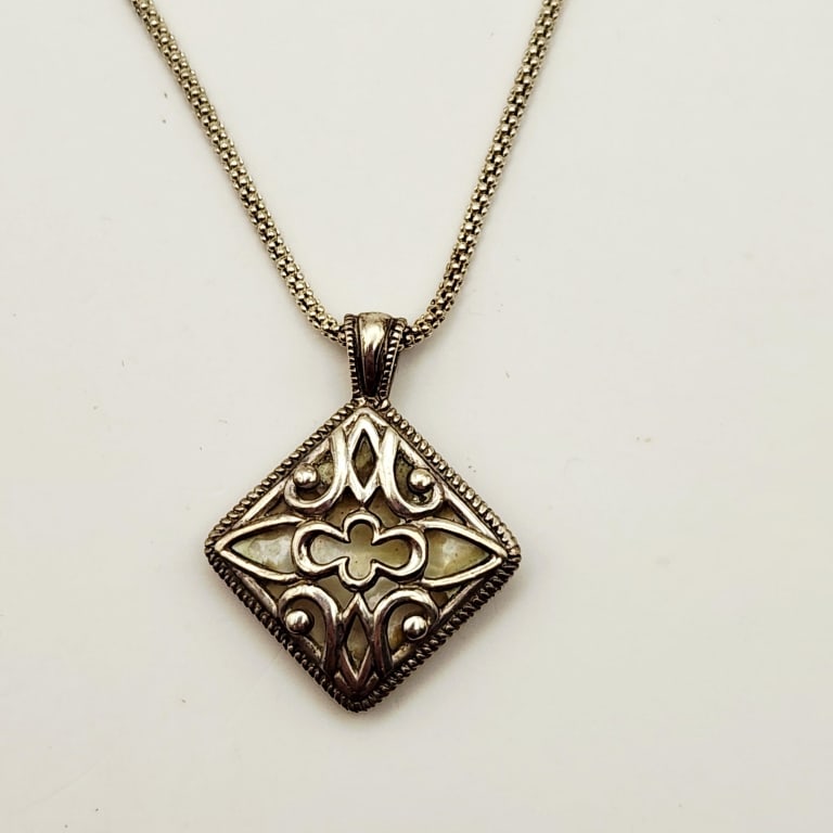 925 Sterling Silver Mother-Of-Pearl Filigree Pendant Necklace Necklace is 24". Weighs 7.8 grams.: Pendant Necklace Necklace is 24". Weighs 7.8 grams.For the best shipping rates, please select "Self-Arranged." Once you've done this, you will automatically be added to Kellie's dedicated shipping dep