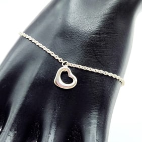 Tiffany & Co Peretti Sterling Silver Open Heart Bracelet Bracelet is 7". Weighs 2.7 grams.
