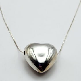925 Sterling Silver Puffed Heart Pendant Necklace Necklace is 30". Weighs 12 grams.