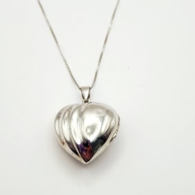 925 Sterling Silver Puffed Heart Locket Pendant Necklace Necklace is 17". Weighs 11 grams.