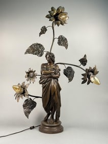 Art Nouveau Bronze Figural Lamp Large bronze lamp with three lights bursting from flowers. Center