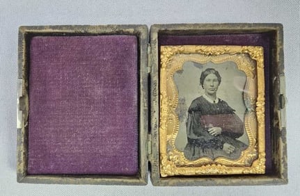Mid-19th Century Cased Ambrotype of a Seated Woman A mid-19th century cased ambrotype, featuring a