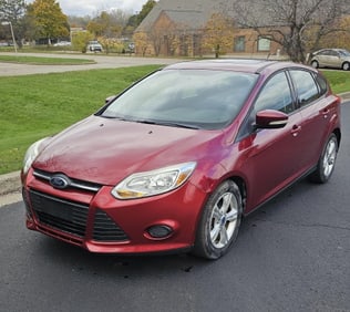 2013 Ford Focus SE Hatchback Please call Sharon at (517) 410-9423 for a test
