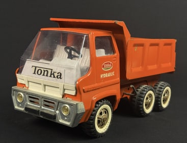 Vintage Orange Tonka Hydraulic Dump Truck No cracks in windows. Some playwear/paint loss on truck