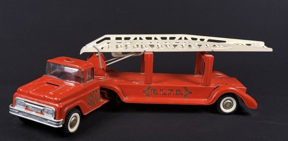 Vintage Metal Buddy L Fire Engine w Ladder Scuffs scratches and other signs of age/playwear. Crack