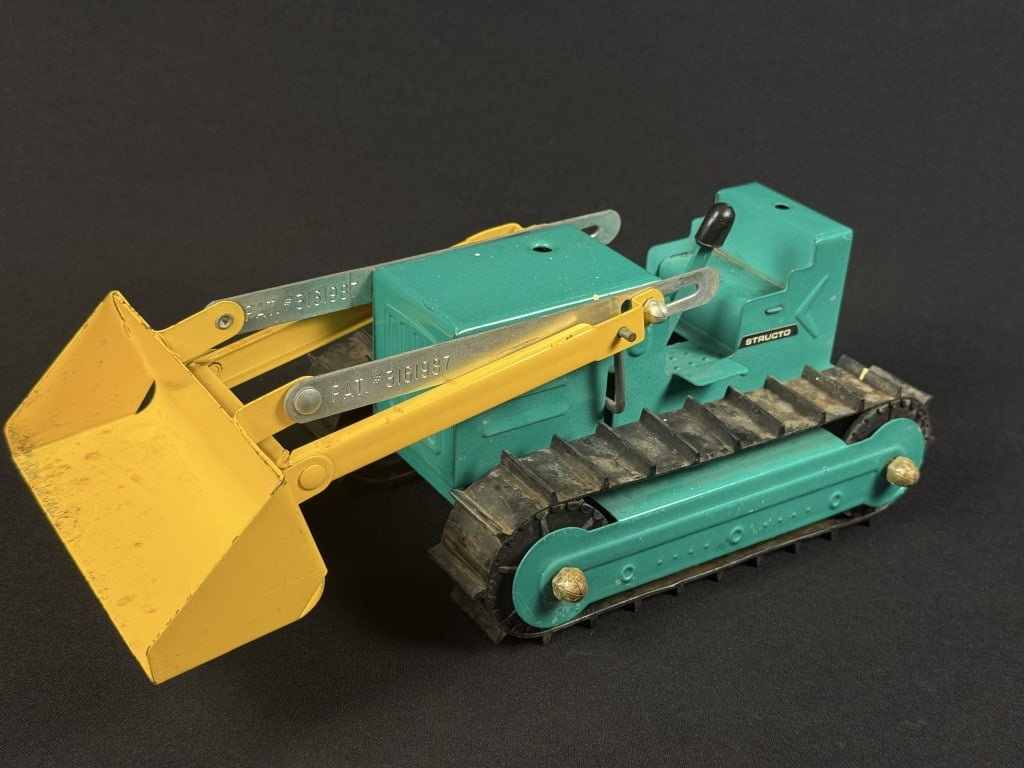 Vintage Metal Structo Bulldozer Toy Light signs of wear and age. Scuffs scratches and some paint: Light signs of wear and age. Scuffs scratches and some paint drops. See photos for further condition details. 11.5 x 6 x 4 inches.