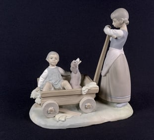 Lladro Porcelain Statue  Girl With Wheelbarrow Matte finish.