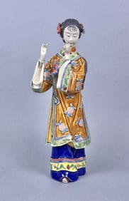 Vintage Chinese Shiwan Porcelain Figure of Lady Crazing present. Some broken tips on head flowers.