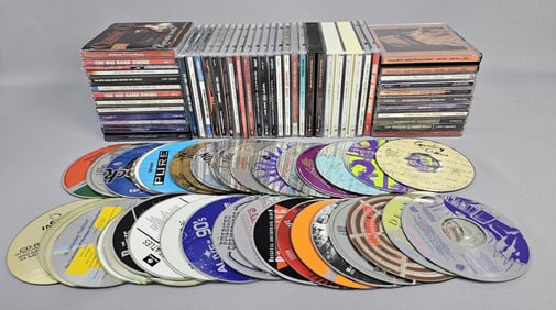 Large Collection of Compact Discs (CDs) This offering comprises a large collection of compact discs