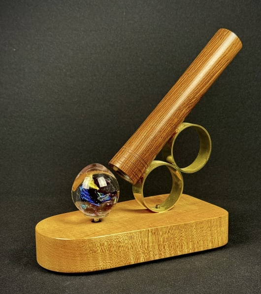 Kaleidoscope On Wind Up Wooden Base Glass element winds up and spins: Glass element winds up and spins Base measures 7 x 4 x 1.25 inches. 8.5 inches tall